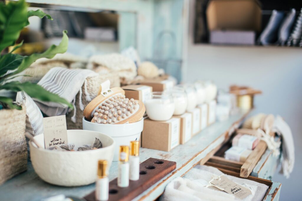 candles and bath products on display at a vendor fair