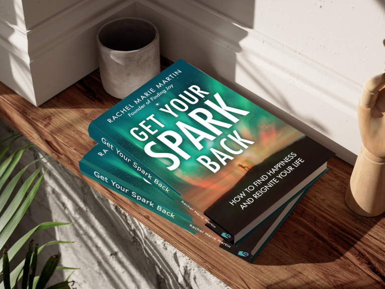 Image is of two books on a shelf. The books are titled Get Your Spark Back. They are written by Rachel Marie Martin, author of the popular blog finding joy